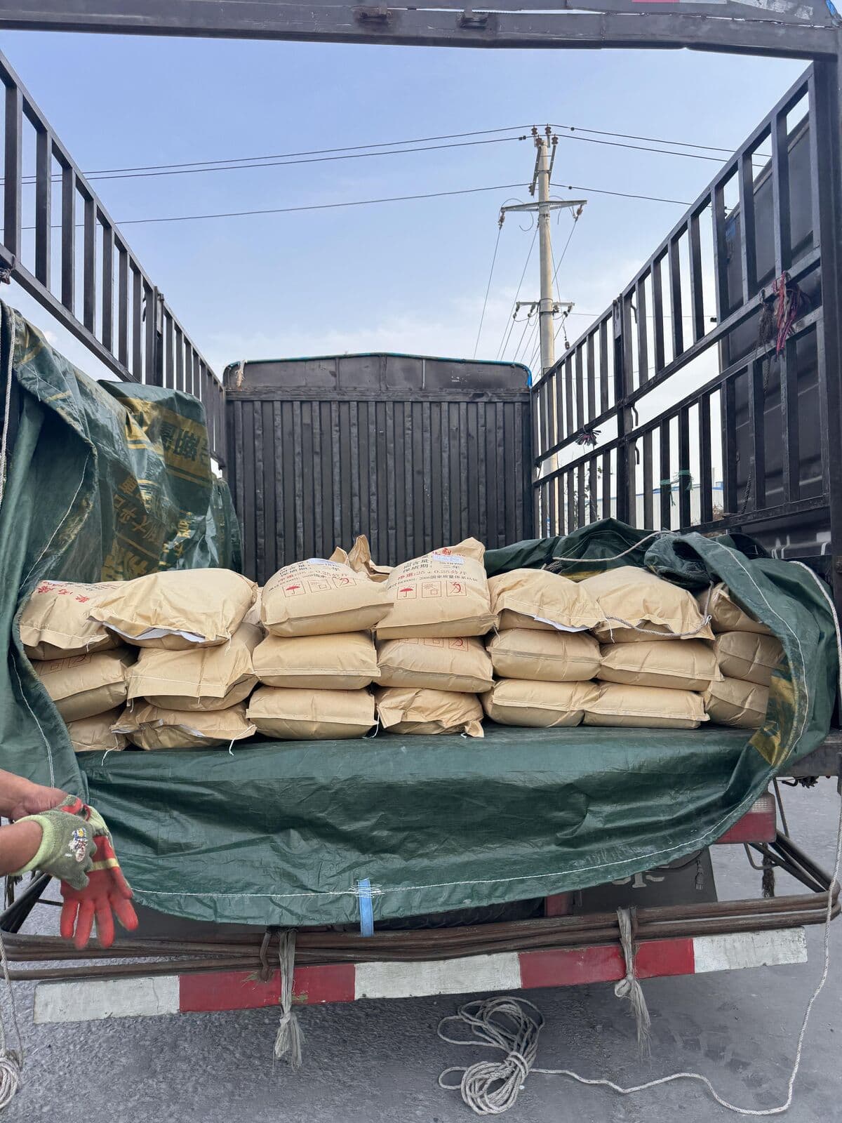 PAM product bags loaded on truck for domestic delivery
