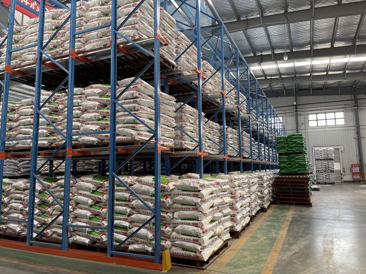 PAM product warehouse with stacked bags on shelves