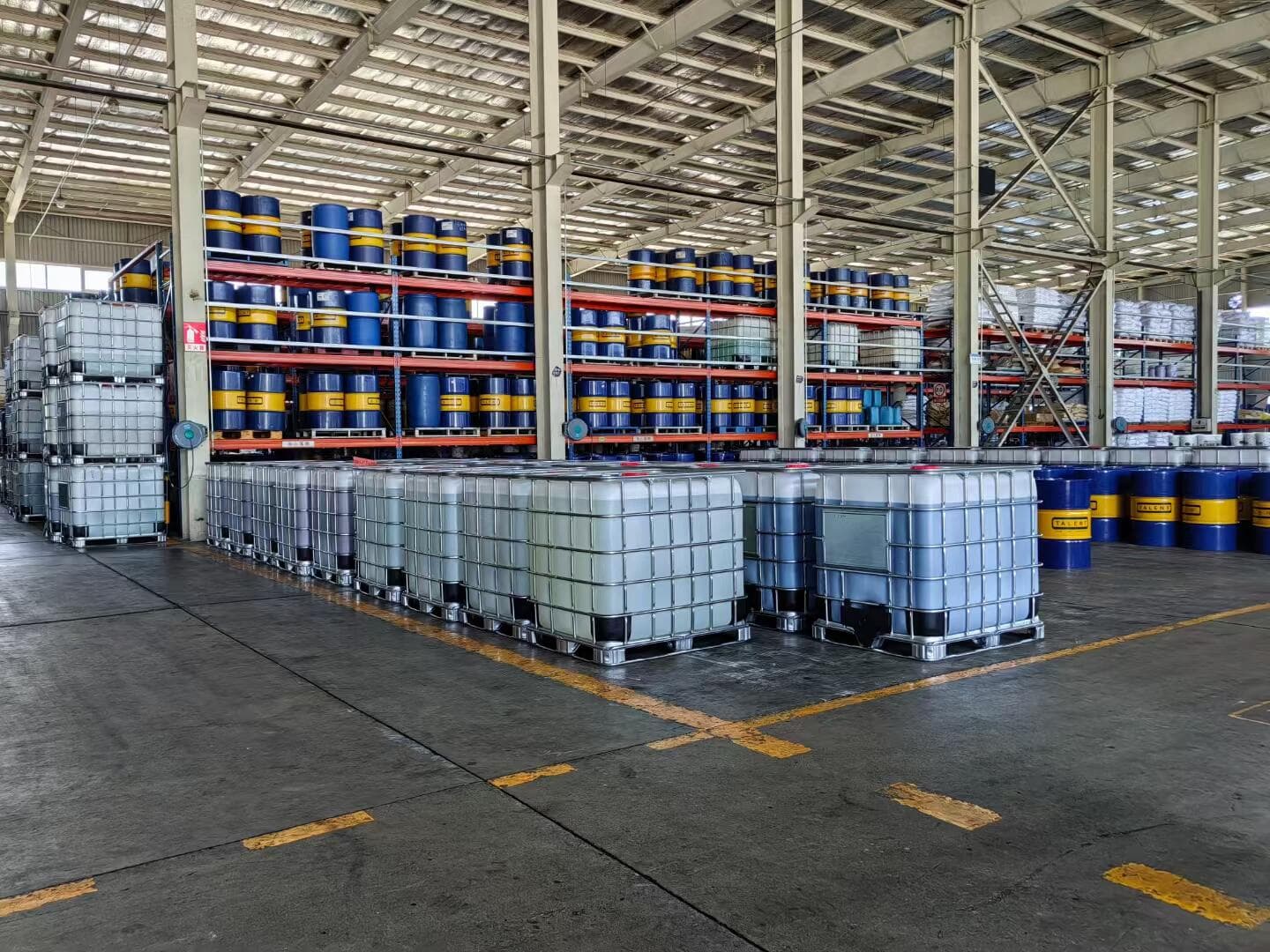 IBC containers and drums in warehouse storage