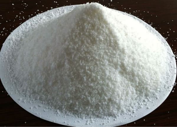 Cationic polyacrylamide powder in an industrial production setting